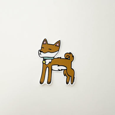 A bold and friendly illustrated Shiba stands by ready to go on a walk!